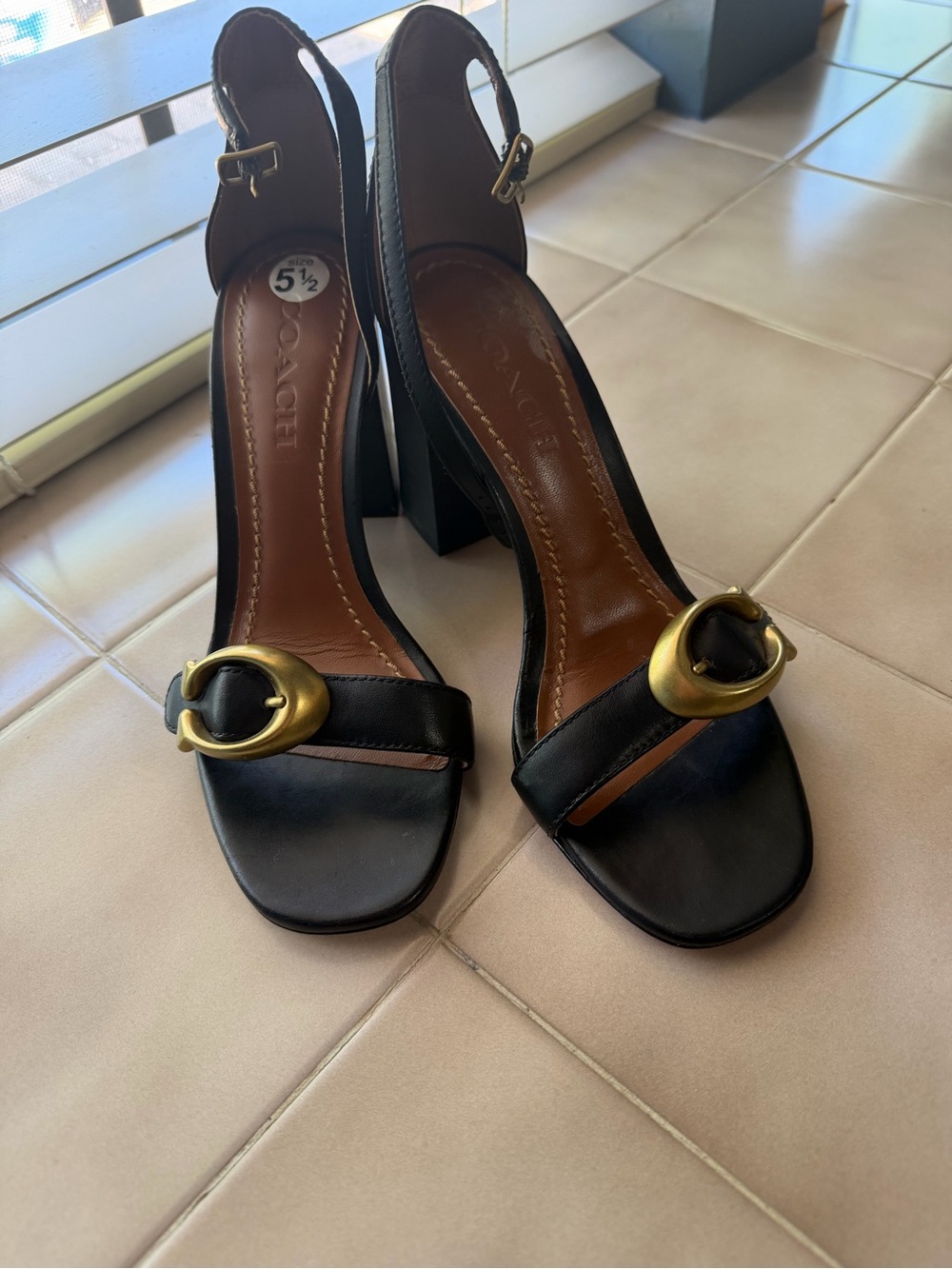 Coach Black Leather Slingback Heels with Gold Buckle Accent